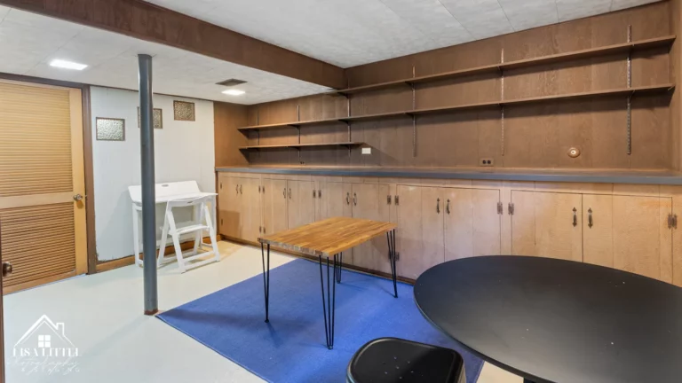 The basement includes tons of storage, a dedicated work space and dining table. Laundry is also located in the basement.
