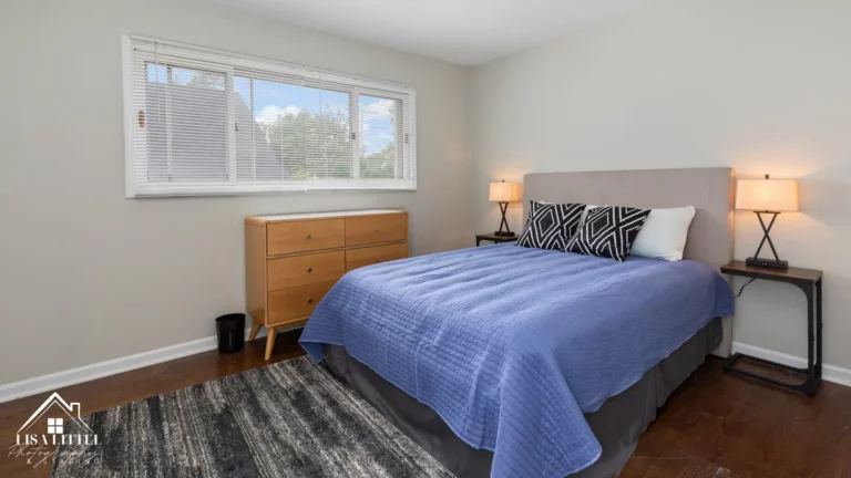 The second bedroom includes a luxurious queen mattress, touch control lamps with USB chargers and a view of the beautiful neighborhood.